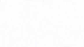 Un miembro del Ejército Mexicano de guardia frente a la fachada acribillada a balazos de la Municipalidad de San Miguel Totolapan.