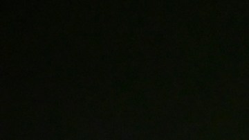 El piloto mexicano Sergio Checo Pérez en el podio del Gran Premio de Japón de F1 en 2022.