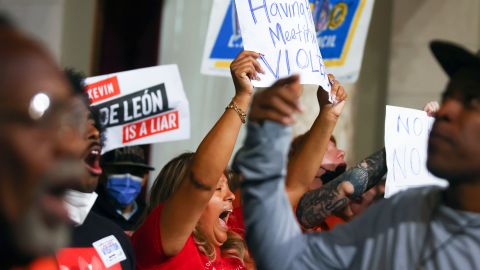 LOS ANGELES, CALIFORNIA - OCTOBER 25: Protestors demonstrate as the L.A. City Council holds its first in-person meeting since voting in new president Paul Krekorian in the wake of a leaked audio recording on October 25, 2022 in Los Angeles, California. L.A. City Council President Nury Martinez resigned in the aftermath of the release of the profanity-laced recording which revealed racist comments amid a discussion of city redistricting. Embattled L.A. City Council member Kevin de Leon was not in attendance in person for the meeting. (Photo by Mario Tama/Getty Images)