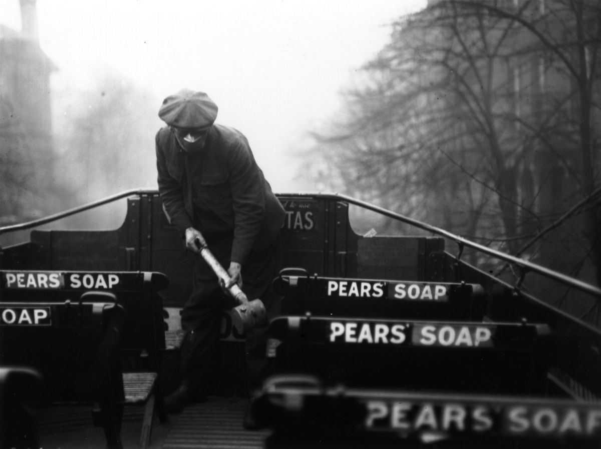 A Man Sprays A Bus With An Anti-Flu Virus During A Post-World War I Pandemic.
