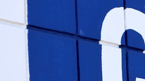 Imagen de un logotipo de General Motors en color azul y blanco.