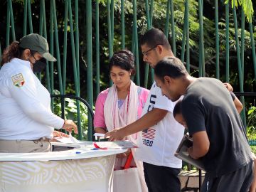 Migrantes de Centroamérica son procesados por el INM en Tapachula, Chiapas.