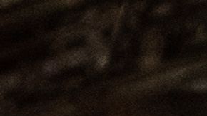 A firefighter walks near firetrucks after a fire in a single-story commercial building sparked an explosion in the Toy District of downtown Los Angeles on May 16, 2020. - At least 11 firefighters were injured in downtown Los Angeles when a fire in a commercial building sparked a major explosion and spread to nearby structures, fire officials said. Some 230 responders battled the blaze as it spread to other buildings in the area before it was extinguished around two hours after it began. (Photo by Apu GOMES / AFP) (Photo by APU GOMES/AFP via Getty Images)