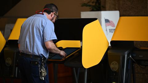 A voter prepares their ballot at a voting booth during early voting ahead of the US midterm elections in Los Angeles, California, on November 1, 2022. (Photo by Robyn Beck / AFP) (Photo by ROBYN BECK/AFP via Getty Images)