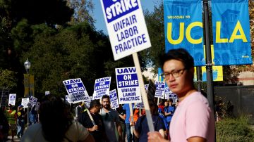 LOS ANGELES, CALIFORNIA - NOVEMBER 15: Union academic workers and supporters march and picket at the UCLA campus amid a statewide strike by nearly 48,000 University of California unionized workers on November 15, 2022 in Los Angeles, California. The strikers are calling for improved wages and benefits at the 10 UC public university campuses across California. (Photo by Mario Tama/Getty Images)