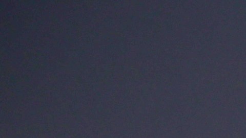 Aficionados en Qatar tomándose fotos con un letrero de la Copa del Mundo 2022.