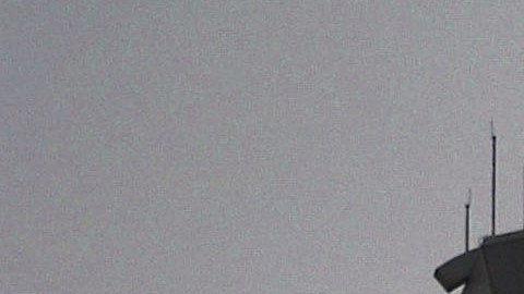 LOS ANGELES, CA - APRIL 10: The old futuristic Encounter restaurant and the Los Angeles Internationl Airport (LAX) control tower are located at the heart of the U-shaped terminal on April 10, 2004 in Los Angeles, California. Los Angeles International Airport has unveiled a $9 billion plan, backed by LA Mayor Jim Hahn, to attempt to transform itself into the nation's highest-security airport. Changes would require passengers to pass through two screening checkpoints, equipped with the latest explosive-detection technologies, as casino-style security cameras would keep watch over them. Curbside pickup and drop-off of passengers at the terminal would be banned. Travellers would have to be let off a mile from the airport where they would go through security screening then ride a "people mover" train to the airport. (Photo by David McNew/Getty Images)