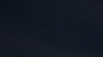 This picture taken on August 12, 2016 shows a Perseid meteor along the Milky Way illuminating the dark sky near Pesquera de Ebro in the province of Burgos, northern Spain, during the "Perseids" meteor shower. Northern hemisphere sky-gazers are in for a special treat on August 11, night with a rare shooting star "outburst", which astronomers hope will not be marred by clouds and a bright Moon. / AFP / CESAR MANSO (Photo credit should read CESAR MANSO/AFP via Getty Images)