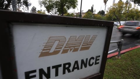 A car arrives at the State of California Department of Motor Vehicles (DMV) in Los Angeles, California on February 13, 2009. The DMV, already infamous for long waiting times, is now further taxed as employees are off the job and the offices are closed two days a month as California government imposes its first-ever unpaid furlough to save money during the fiscal crisis. The action is in connection with Schwarzenegger�s executive order that addresses the state�s 42 billion USD deficit and ongoing fiscal crisis. Schwarzenegger has also threatened to lay off as many as 10,000 state employees if a new budget is not passed this week. AFP PHOTO/ ROBYN BECK (Photo credit should read ROBYN BECK/AFP via Getty Images)