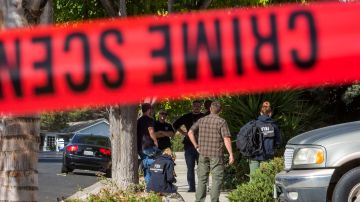 TOPSHOT - FBI agents are collecting evidence at the home of suspected nightclub shooter Ian David Long in Thousand Oaks, northwest of Los Angeles, on November 8, 2018. - The gunman who killed 12 people in a crowded California country music bar has been identified as 28-year-old Ian David Long, a former Marine, the local sheriff said Thursday November 8, 2018. The suspect, who was armed with a .45-caliber handgun, was found deceased at the Borderline Bar and Grill, the scene of the shooting in the city of Thousand Oaks northwest of downtown Los Angeles. (Photo by Apu GOMES / AFP) (Photo by APU GOMES/AFP via Getty Images)