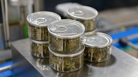 Hemp flower containers sit on a table at Empire Standard, a hemp extract processing and distribution plant, on April 13, 2021 in Binghamton, New York. - New York's governor last month signed a law allowing its possession and use for adults aged 21 and older, and expanding its distribution for medical purposes.That allows companies like Empire Standard, which already are well-versed in cannabis cultivation for use in CBD, to now sell products with high concentrations of THC. (Photo by Angela Weiss / AFP) (Photo by ANGELA WEISS/AFP via Getty Images)