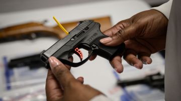 A Ruger pistol, or handgun, is displayed during a gun 'buyback' event held by the New York Police Department (NYPD) and the office of the Attorney General, in the New York borough of Brooklyn on May 22, 2021. - The 'no questions asked' buyback event offers a chance for gun owners to trade in firearms for gift cards and iPads, as part of ongoing efforts by the NYPD to tackle gun crime. (Photo by Ed JONES / AFP) (Photo by ED JONES/AFP via Getty Images)