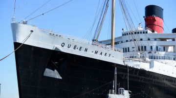The Queen Mary historic ocean liner docked at Long Beach, California, on February 18, 2022. - The Queen Mary ocean liner, closed during the pandemic and is undergoing major repairs and renovations, promises to bring back the glamour and nostalgia of the golden age of shipping in December when it is expected to reopen to the public. (Photo by Patrick T. FALLON / AFP) (Photo by PATRICK T. FALLON/AFP via Getty Images)