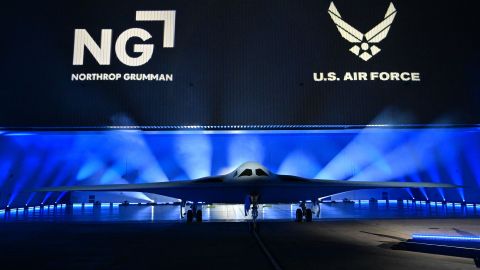 The B-21 Raider is unveiled during a ceremony at Northrop Grumman's Air Force Plant 42 in Palmdale, California, December 2, 2022. - The high-tech stealth bomber can carry nuclear and conventional weapons and is designed to be able to fly without a crew on board. The B-21 -- which is on track to cost nearly $700 million per plane and is the first new US bomber in decades -- will gradually replace the B-1 and B-2 aircraft, which first flew during the Cold War. (Photo by Frederic J. BROWN / AFP) (Photo by FREDERIC J. BROWN/AFP via Getty Images)