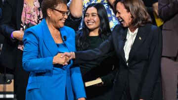US Vice President Kamala Harris congratulates Karen Bass after she was sworn in as the Mayor of Los Angeles during her inauguration at LA Live in Los Angeles, California, on December 11, 2022. (Photo by Frederic J. Brown / AFP) (Photo by FREDERIC J. BROWN/AFP via Getty Images)