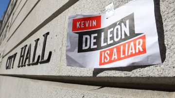 LOS ANGELES, CALIFORNIA - OCTOBER 18: A sign denouncing L.A. City Council member Kevin de Leon is posted outside City Hall in the wake of a leaked audio recording on October 18, 2022 in Los Angeles, California. L.A. City Council President Nury Martinez resigned last week in the aftermath of the release of the profanity-laced recording which revealed racist comments amid a discussion of city redistricting. (Photo by Mario Tama/Getty Images)