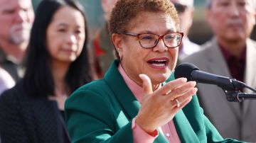 LOS ANGELES, CALIFORNIA - DECEMBER 16: Los Angeles Mayor Karen Bass speaks at the podium at the Lorena Plaza affordable housing project site where she signed an affordable housing executive directive on December 16, 2022 in Los Angeles, California. The directive aims to 'dramatically accelerate and lower the cost of building affordable housing and shelter in Los Angeles' amid a housing and homelessness crisis in the city. (Photo by Mario Tama/Getty Images)