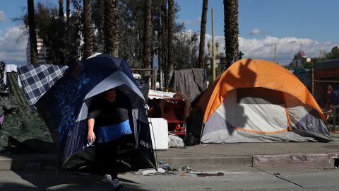 LOS ANGELES, CA - JANUARY 24: Lisa Rogers, a homeless woman, carries her tent as she relocates her camp on January 24, 2017 in Los Angeles, California. According to a 2016 report by the U.S. Department of Housing and Urban Development, Los Angeles has the highest number of homeless people in the nation with close to 13,000 living on the streets. The annual Greater Los Angeles Homeless Count begins today and will continue through Thursday. (Photo by Justin Sullivan/Getty Images)