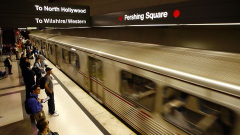 LOS ANGELES, CA - JUNE 3: Passengers wait for Metro Rail subway trains during rush hour June 3, 2008 in Los Angeles, California. Skyrocketing gas prices are driving more commuters to take trains and buses to work instead of their cars. In the first three months of 2008, the number of trips taken on public transport in the US rose 3 percent to 2.6 billion, creating pressures on some transportation systems to cope with increasing ridership. Transit officials in southern California and elsewhere are now encouraging employers to stagger employee schedules to ease the rush hour crunch on trains and buses and Metrolink plans to add 107 rail cars to its fleet of 155 as soon as next year. (Photo by David McNew/Getty Images)