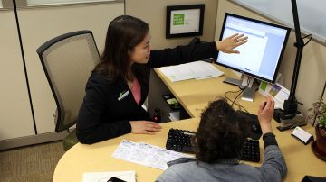SAN FRANCISCO, CA - APRIL 15: H & R Block tax preparer Catherine Roman (L) helps Clair Czarecki (R) with her taxes at an H & R Block office on April 15, 2011 in San Francisco, California. Despite having an extra three days to file your income taxes this year, an estimated 15 to 20 million people will wait to the very last minute to file their taxes with a high number relying on tax preparation services. (Photo by Justin Sullivan/Getty Images)