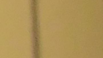 Paramedics wearing facemasks work behind an ambulance at the Garfield Medical Center in Monterey Park, California on March 19, 2020. - All residents of California were ordered to stay at home March 19, 2020, in a bid to battle the coronavirus pandemic in the most populous state in the US. Los Angeles residents were ordered to stay at home by the city's mayor Eric Garcetti on Thursday in a bid to battle the coronavirus pandemic. (Photo by Frederic J. BROWN / AFP) (Photo by FREDERIC J. BROWN/AFP via Getty Images)