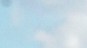 A person walks a dog as snow-topped mountains stand behind the Los Angeles downtown skyline after sunrise following heavy rains as seen from the Kenneth Hahn State Recreation Area on December 29, 2020 in Los Angeles, California. (Photo by Patrick T. FALLON / AFP) (Photo by PATRICK T. FALLON/AFP via Getty Images)