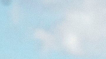 A person walks a dog as snow-topped mountains stand behind the Los Angeles downtown skyline after sunrise following heavy rains as seen from the Kenneth Hahn State Recreation Area on December 29, 2020 in Los Angeles, California. (Photo by Patrick T. FALLON / AFP) (Photo by PATRICK T. FALLON/AFP via Getty Images)