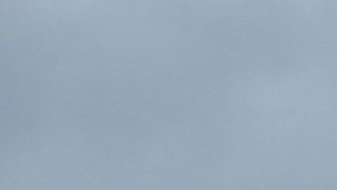 A storm cloud hovers over Los Angeles, California on December 13, 2021. - A storm which has already hit Northern California makes its way south and is expected to bring heavy rain and snow to the mountains of Southern California, raising concern of midslides in fire-ravaged areas. (Photo by Frederic J. BROWN / AFP) (Photo by FREDERIC J. BROWN/AFP via Getty Images)