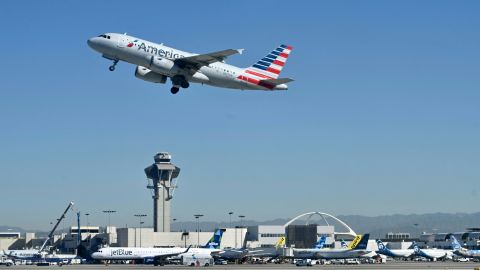 An American Airlines Airbus 319 plane takes off from the Los Angeles International Airport (LAX) on March 23, 2022. (Photo by Daniel SLIM / AFP) (Photo by DANIEL SLIM/AFP via Getty Images)