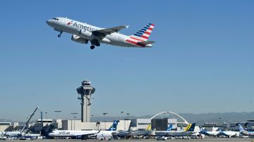 An American Airlines Airbus 319 plane takes off from the Los Angeles International Airport (LAX) on March 23, 2022. (Photo by Daniel SLIM / AFP) (Photo by DANIEL SLIM/AFP via Getty Images)