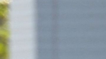 Los Angeles County Sheriff's Deputies gather after breaking into a van with a body in the driver's seat in Torrance, California, on January 22, 2023. - California police hunting the gunman who killed 10 people at a dance club during Lunar New Year celebrations broke into a van after a lengthy standoff Sunday, where images showed a body slumped in the driver's seat. The hunt began 12 hours earlier after a man -- described by police as Asian -- began firing at a club in Monterey Park, a city in Los Angeles County with a large Asian community. (Photo by Robyn BECK / AFP) (Photo by ROBYN BECK/AFP via Getty Images)