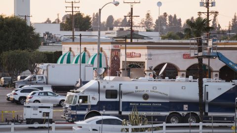 MONTEREY PARK, CA - JANUARY 22: Members of law enforcement investigate the scene of a deadly shooting on January 22, 2023 in Monterey Park, California. 10 people were killed and 10 more were injured at a dance studio in Monterey Park near a Lunar New Year celebration on Saturday night. (Photo by Eric Thayer/Getty Images)