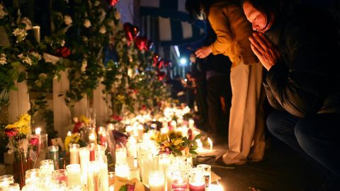 MONTEREY PARK, CALIFORNIA - JANUARY 25: People attend a candlelight vigil at the growing memorial outside the Star Ballroom Dance Studio where a deadly mass shooting took place on January 25, 2023 in Monterey Park, California. Eleven people died and nine more were injured at the studio near a Lunar New Year celebration last Saturday night. U.S. Vice President Kamala Harris visited the memorial today and met with families of victims in the predominantly Asian American community of Monterey Park. (Photo by Mario Tama/Getty Images)