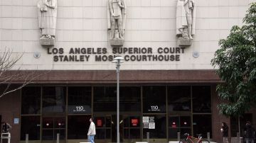 LOS ANGELES - FEBRUARY 19: A man walks by the Los Angeles County Superior courthouse where Mark Vincent Kaplan, attorney for Kevin Federline, Britney Spears' ex-husband, attended a session February 19, 2008 in Los Angeles, California. The former couple's attorneys met in court to discuss shared visitation rights with their children. (Photo by Valerie Macon/Getty Images)