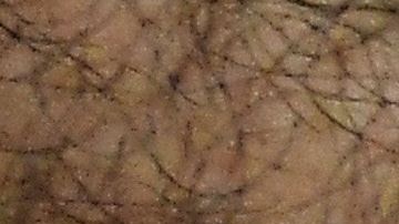 Detail of the hands of former Salvadoran President (2004-2009) Elias Antonio Saca with handcuffs, taken as he waits, along with six of his collaborators, for the judge to arrive in court in San Salvador on May 16, 2018, to face charges of embezzlement and laundering for allegedly diverting 298 million dollars. - Saca was arrested in October 2016 with his former private secretary and former communications secretary, among others, suspected of pocketing $246 million in public funds during his 2004-2009 mandate. They have been charged with embezzlement, criminal association and money laundering. (Photo by Marvin RECINOS / AFP) (Photo credit should read MARVIN RECINOS/AFP via Getty Images)