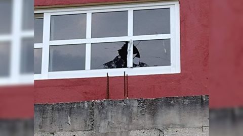 Ventana rota por disparo