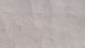 Imagen de un logotipo de la marca Sams, en color azul, colocado sobre un muro de color gris.