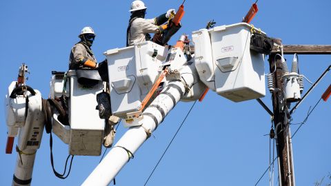 VENTURA, CA - MAY 13: A Southern California Edison crew installs a new overhead switch for circuit reliability on May 13, 2020 in Ventura, California. During the coronavirus (COVID-19) pandemic Edison is focused only on essential work to maintain the grid. According to Skylar Graybill, interim district manager for Ventura, with so many more people at home, they are focused on public safety and circuit reliability. Graybill says, "With our crews, we practice a daily wellness screening and we keep our crews in the same pods...that helps to minimize contact...This is the principal the fire departments are using and it's the same for us... We also have some sequestered crews of vital workers. They are living in RVs in a central zone and are more isolated from contact." (Photo by Brent Stirton/Getty Images)