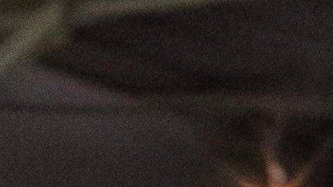 Bishop David O'Connell looks at candles placed on an altar representing people who lost their lives during the coronavirus pandemic, during a non-denominational memorial service to provide a space for community members who have lost loved ones in 2020 at the Saint Cornelius Catholic Church in Long Beach, California on November 14, 2020. - After California passed 1 million coronavirus cases a travel advisory was issued on November 13 urging a two-week quarantine for those arriving from other states or countries. (Photo by Apu GOMES / AFP) (Photo by APU GOMES/AFP via Getty Images)