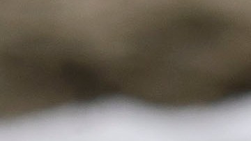 Sadie plays in hail on the beach after winter storms blanketed the region with rain, snow, and hail, on January 29, 2021 in Manhattan Beach, California. (Photo by Patrick T. FALLON / AFP) (Photo by PATRICK T. FALLON/AFP via Getty Images)
