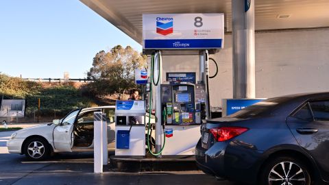 People get gas for their vehicles at a petrol station in Alhambra, California on October 19, 2022. - US President Joe Biden will announce the release of an additional 15 million barrels from the Strategic Petroleum Reserve in an effort to lower US gas prices, completing the plan to release a total of 180 million barrels that was announced earlier this year. (Photo by Frederic J. BROWN / AFP) (Photo by FREDERIC J. BROWN/AFP via Getty Images)