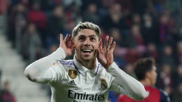 Real Madrid's Uruguayan midfielder Federico Valverde celebrates after scoring his team's first goal during the Spanish League football match between CA Osasuna and Real Madrid CF at El Sadar stadium in Pamplona, on February 18, 2023. (Photo by CESAR MANSO / AFP) (Photo by CESAR MANSO/AFP via Getty Images)