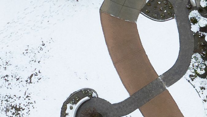 Snow covers homes in the Haven Estates neighborhood of Rancho Cucamonga, California, on February 25, 2023. - Heavy snow fell in southern California as the first blizzard in a generation pounded the hills around Los Angeles, with heavy rains threatening flooding in other places. (Photo by JOSH EDELSON / AFP) (Photo by JOSH EDELSON/AFP via Getty Images)