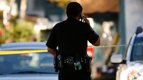 SEAL BEACH, CA - OCTOBER 12: Police investigate a murder scene at Salon Meritage hair salon after a man shot nine people, killing eight of them, on October 12, 2011 in Seal Beach, California. The shooting is being reported as the worst mass killing in Orange County history. (Photo by David McNew/Getty Images)