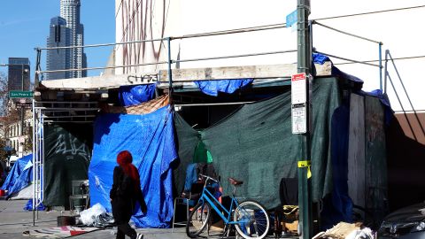 LOS ANGELES, CALIFORNIA - DECEMBER 14: A homeless encampment lines a sidewalk in the Skid Row community on December 14, 2022 in Los Angeles, California. New Los Angeles Mayor Karen Bass declared a state of emergency on her first day in office in an effort to tackle the city’s homelessness crisis where an estimated 40,000 residents are unhoused. The Skid Row community is home to thousands of people who either live on the streets or in shelters. (Photo by Mario Tama/Getty Images)