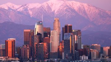 LOS ANGELES, CALIFORNIA - JANUARY 31: The downtown skyline stands with the snow-capped San Gabriel Mountains visible beyond on January 31, 2023 in Los Angeles, California. California's increased mountain snowpack following recent storms has helped ease extreme drought conditions statewide. On January 3rd, the U.S. Drought Monitor stated 27 percent of California was under ‘extreme drought’. Their latest measurement on January 24 showed none of California to still be in the elevated ‘extreme drought’ status. (Photo by Mario Tama/Getty Images)