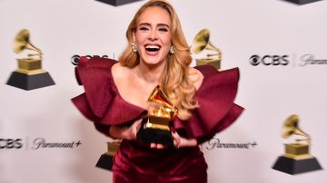 LOS ANGELES, CALIFORNIA - FEBRUARY 05: Adele poses with the Best Pop Solo Performance Award for "Easy on Me" in the press room during the 65th GRAMMY Awards at Crypto.com Arena on February 05, 2023 in Los Angeles, California. (Photo by Alberto E. Rodriguez/Getty Images for The Recording Academy)