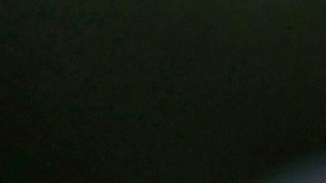 Tiger Woods junto a Justin Thomas.