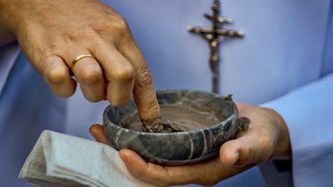 MANILA, PHILIPPINES - FEBRUARY 22: A Catholic nun prepares ash to be given to Filipino Catholics as they observe Ash Wednesday at Baclaran Church on February 22, 2023 in Paranaque, Metro Manila, Philippines. Ash Wednesday marks the start of the Season of Lent, which begins 40 days before Easter, in the Roman Catholic calendar and Catholics the world over remember it as a season of penance, reflection and fasting in preparation for Christ's Resurrection. (Photo by Ezra Acayan/Getty Images)