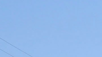 Police officers investigate the scene near Pearson Park in Anaheim, California, February 27, 2016, after three counter-protesters were stabbed while clashing with Ku Klux Klan members staging a rally. Thirteen people were arrested. / AFP / RINGO CHIU (Photo credit should read RINGO CHIU/AFP via Getty Images)